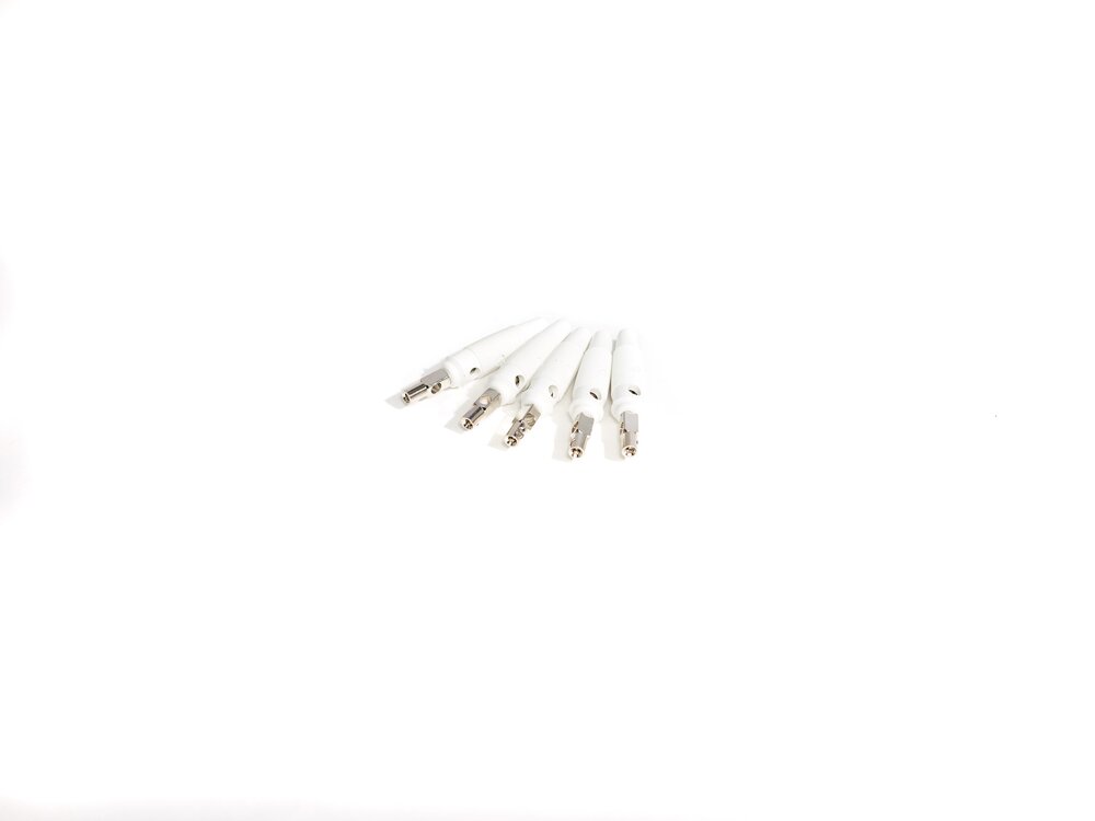 A handful of individual white banana plugs