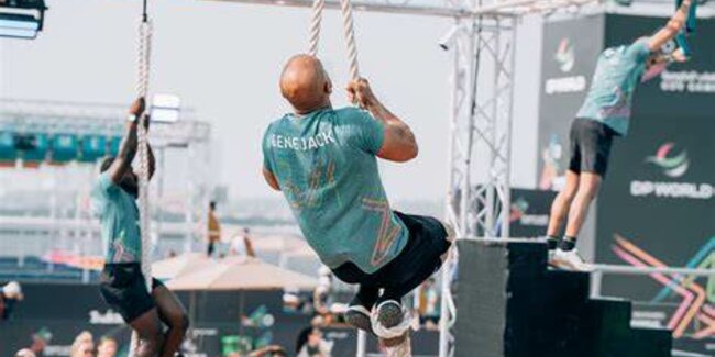 Three Ninja Parkour participants climbing ropes and completing obstacles